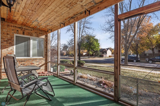 sunroom with wood ceiling