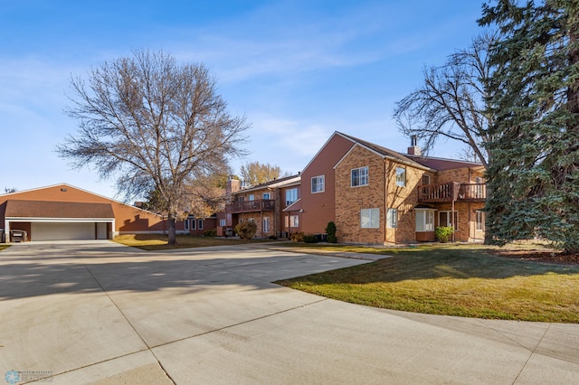 view of property exterior with a yard and a garage