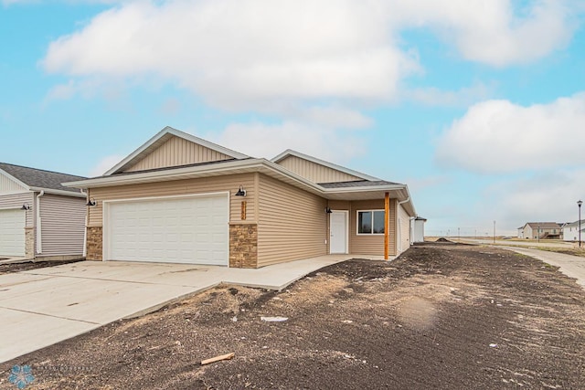 single story home featuring a garage