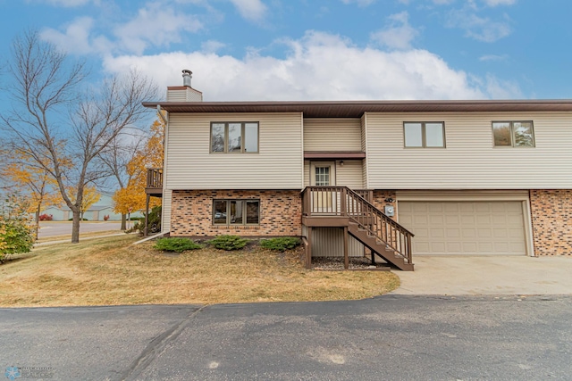 split foyer home featuring a garage