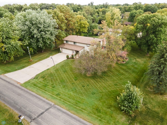 birds eye view of property with a rural view