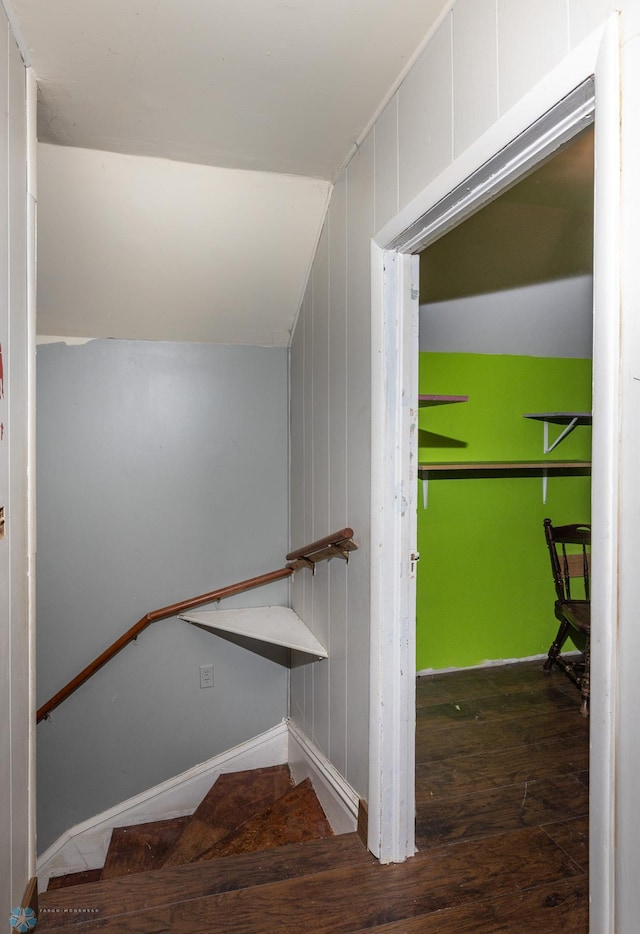 stairway featuring hardwood / wood-style floors