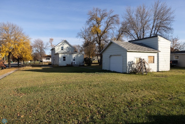 view of yard featuring a garage