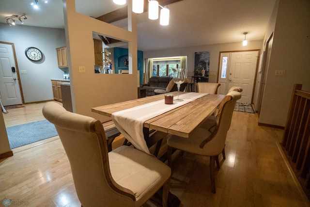 dining space with light wood-type flooring