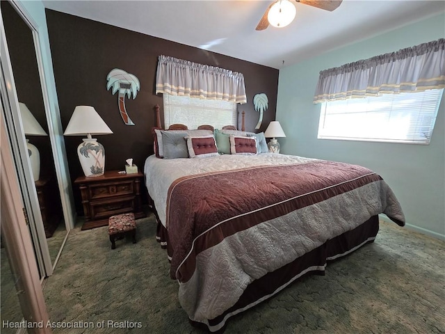 bedroom featuring carpet, ceiling fan, and a closet