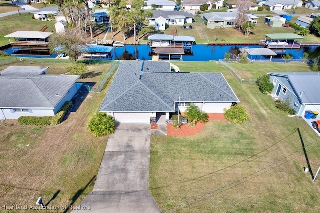 drone / aerial view featuring a water view