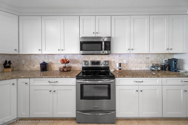 130 Deanna Dr, Lake Placid, FL 33852 - kitchen with appliances with stainless steel finishes and white cabinetry