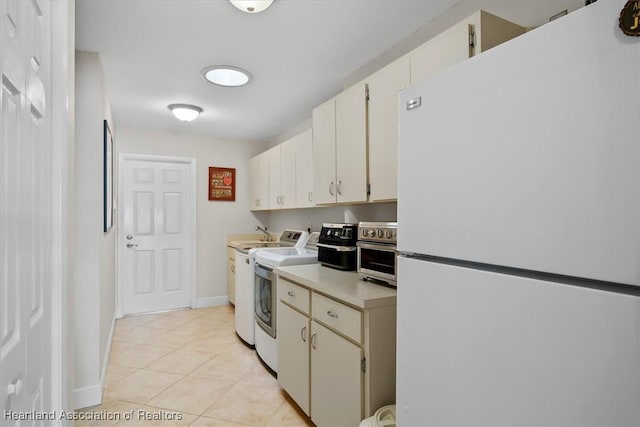 130 Deanna Dr, Lake Placid, FL 33852 - laundry area featuring baseboards and light tile patterned floors