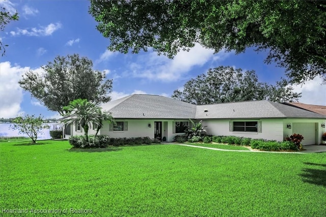 130 Deanna Dr, Lake Placid, FL 33852 - ranch-style house featuring an attached garage, a front lawn, and stucco siding