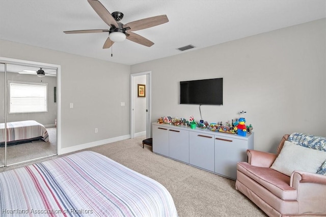 130 Deanna Dr, Lake Placid, FL 33852 - bedroom with light carpet, ceiling fan, and a closet