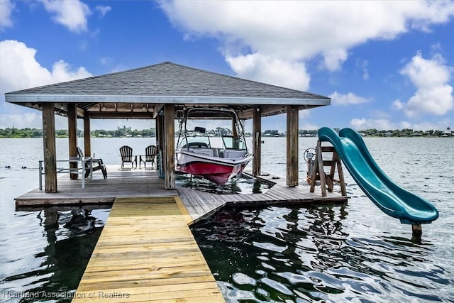 130 Deanna Dr, Lake Placid, FL 33852 - dock featuring boat lift and a water view