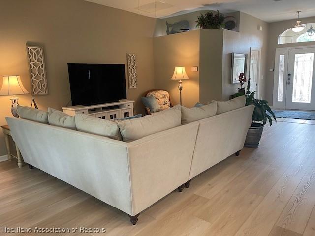3929 Puma Dr, Avon Park, FL 33825 - living room featuring light wood-style floors