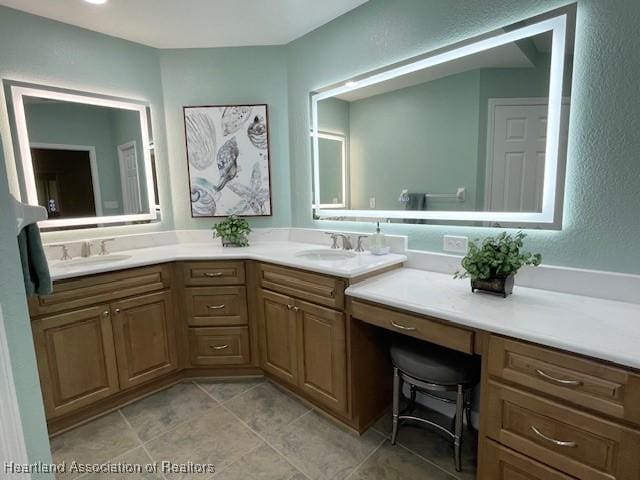 3929 Puma Dr, Avon Park, FL 33825 - full bathroom with double vanity, tile patterned floors, and a textured wall