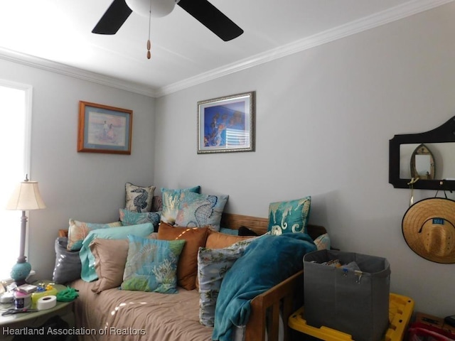 bedroom with crown molding and ceiling fan