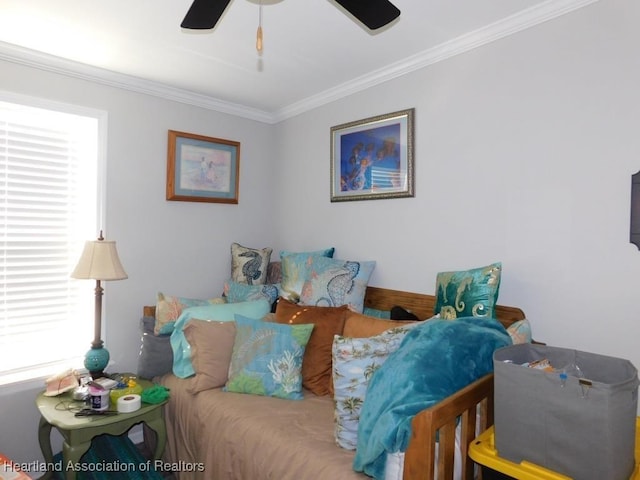 living room with crown molding and ceiling fan