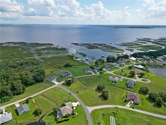 bird's eye view with a water view