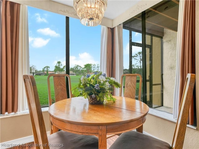 dining area featuring a chandelier