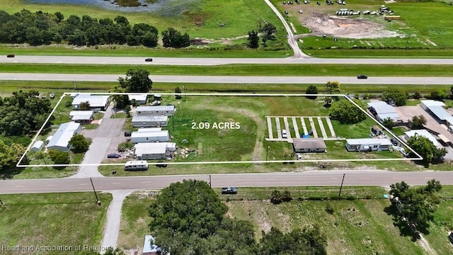 2099 NE Opal Dr, Arcadia, FL 34266 - aerial view of property and surrounding area with property parcel outlined