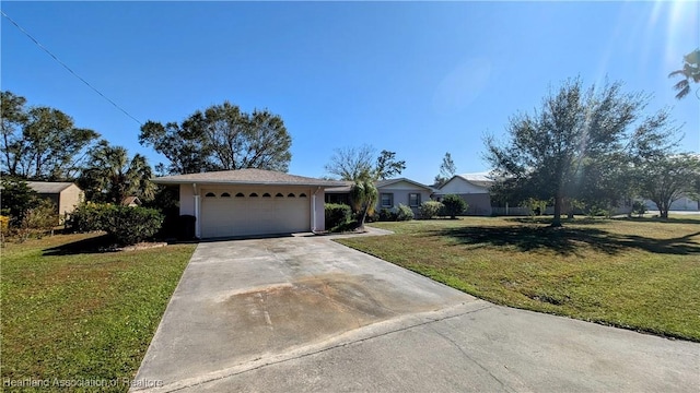 single story home featuring a front yard and a garage