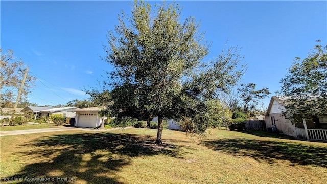 view of yard with a garage