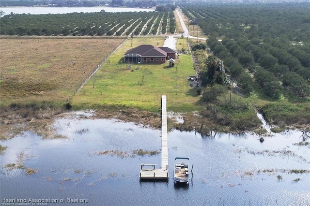 bird's eye view featuring a water view and a rural view