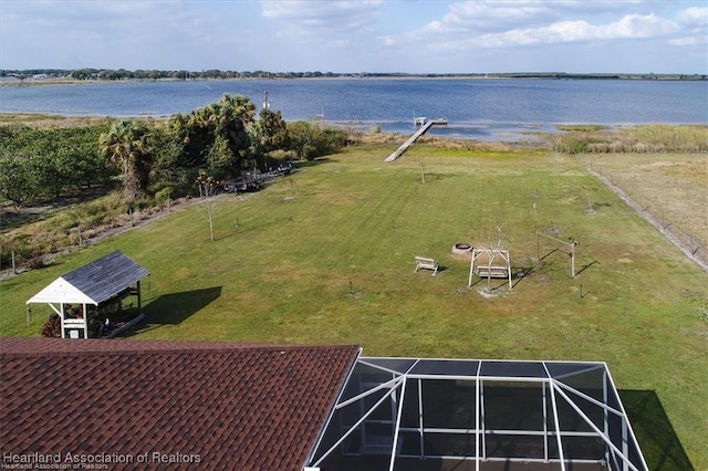 drone / aerial view with a water view