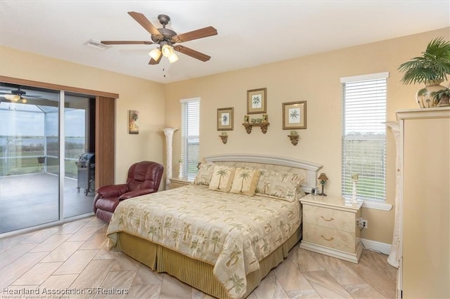 bedroom with visible vents, baseboards, ceiling fan, and access to outside