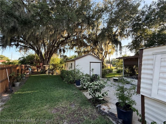 100 Daisy Ln, Lake Placid, FL 33852 - view of yard with a storage unit and an outdoor structure