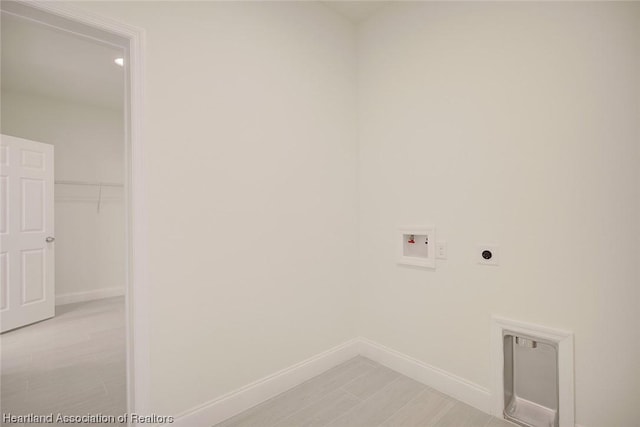 washroom featuring hookup for an electric dryer and washer hookup