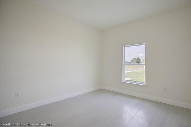 empty room featuring hardwood / wood-style floors