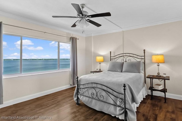 bedroom featuring a water view, ceiling fan, ornamental molding, and dark hardwood / wood-style floors