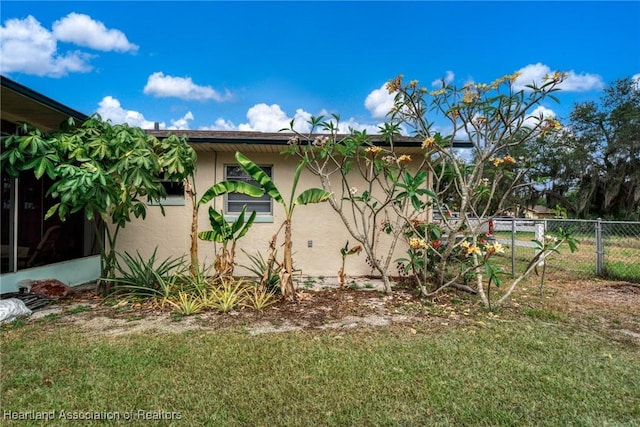1536 Meadowbrook St, Lake Placid, FL 33852 - view of side of home featuring stucco siding