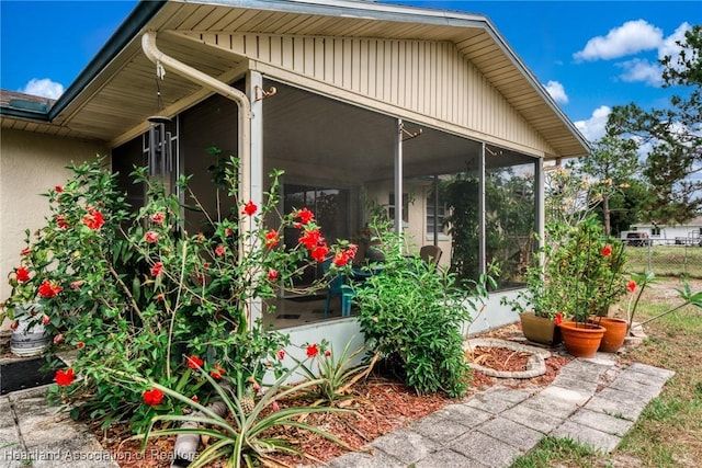 1536 Meadowbrook St, Lake Placid, FL 33852 - view of property exterior featuring a sunroom and fence