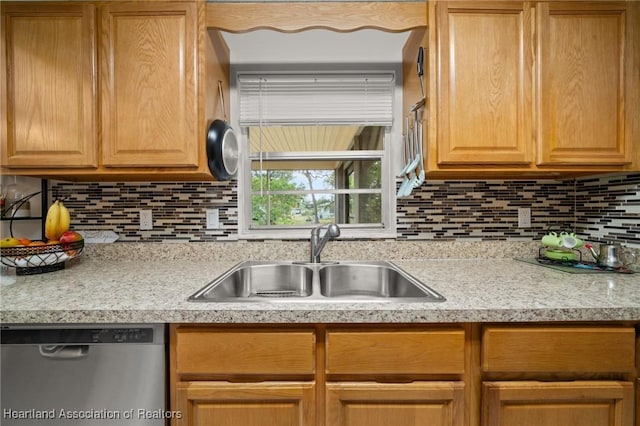 1536 Meadowbrook St, Lake Placid, FL 33852 - kitchen with dishwasher, a sink, light countertops, and decorative backsplash