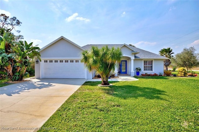 ranch-style house featuring an attached garage, concrete driveway, a front yard, and stucco siding