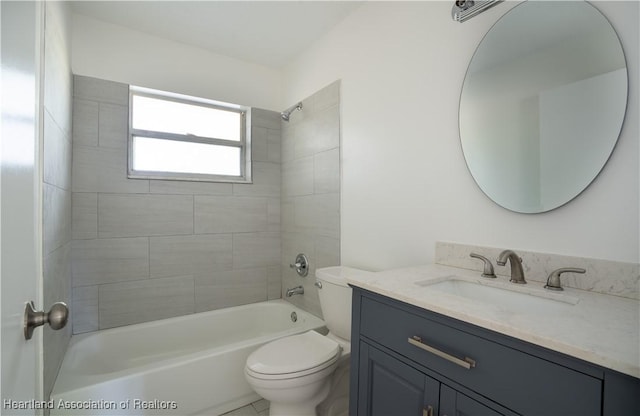 bathroom with toilet, bathtub / shower combination, and vanity