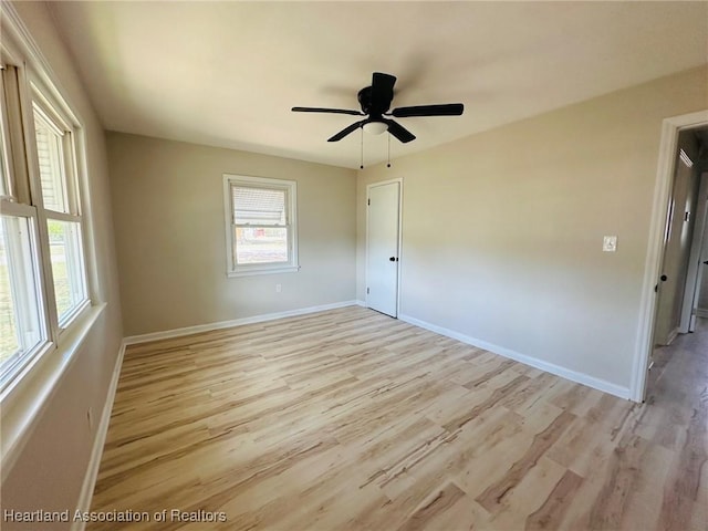 602 Wilhite St, Avon Park, FL 33825 - unfurnished room with light wood-style flooring, baseboards, and ceiling fan
