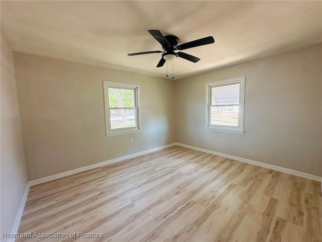 602 Wilhite St, Avon Park, FL 33825 - unfurnished room featuring light wood-style floors, baseboards, and ceiling fan