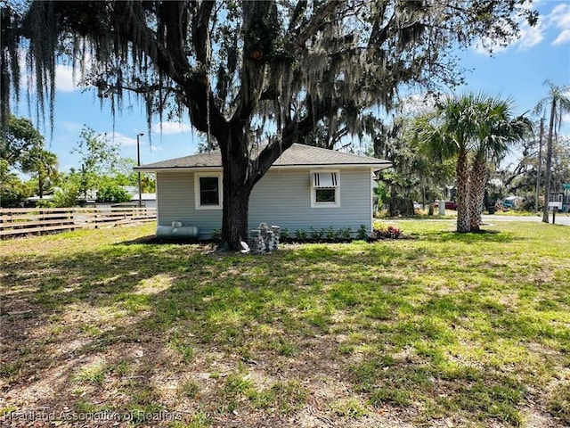 602 Wilhite St, Avon Park, FL 33825 - exterior space featuring a yard and fence