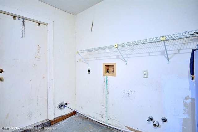 laundry area with hookup for an electric dryer, gas dryer hookup, laundry area, and hookup for a washing machine