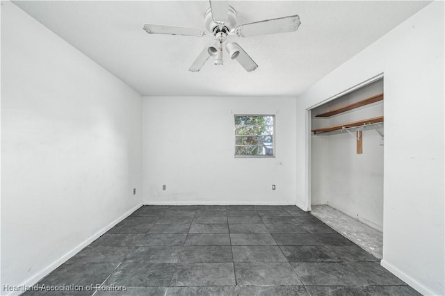 unfurnished bedroom with a closet and ceiling fan