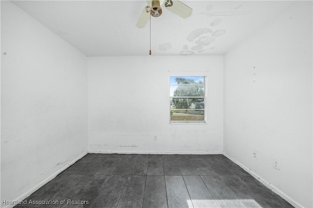 spare room featuring ceiling fan