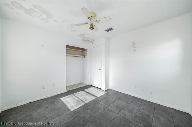 unfurnished bedroom with a closet and ceiling fan