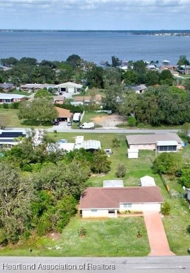 bird's eye view with a water view