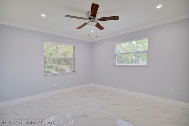 unfurnished room featuring plenty of natural light, crown molding, and ceiling fan