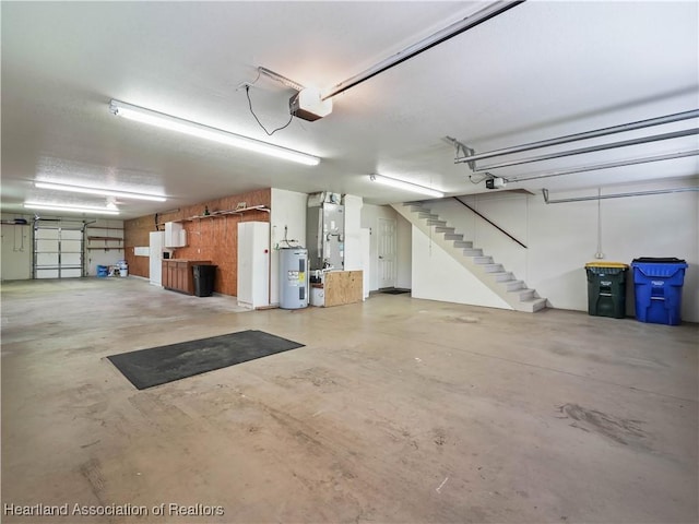 897 Entrance Rd, Avon Park, FL 33825 - garage featuring water heater and a garage door opener