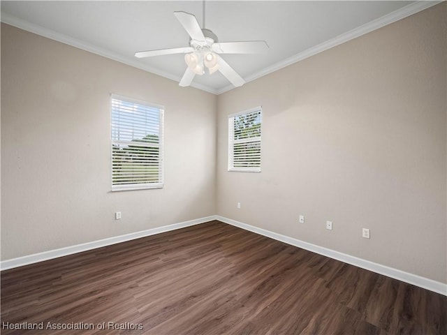 897 Entrance Rd, Avon Park, FL 33825 - spare room with dark wood-style floors, a healthy amount of sunlight, baseboards, and ornamental molding