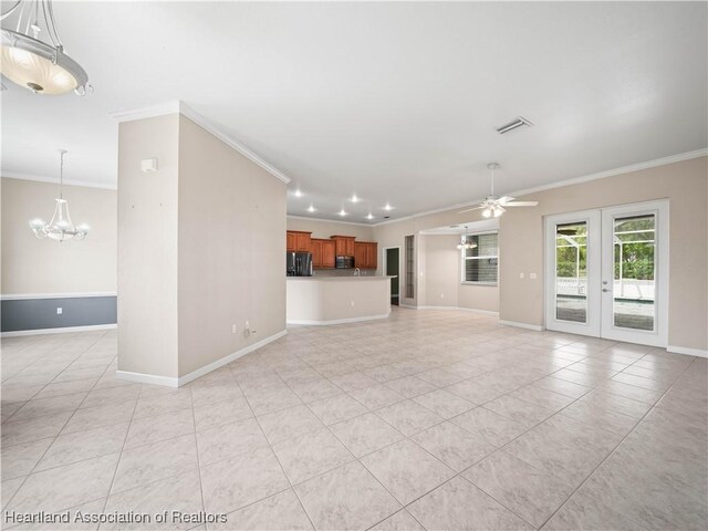 897 Entrance Rd, Avon Park, FL 33825 - unfurnished living room with ornamental molding, french doors, baseboards, and light tile patterned floors