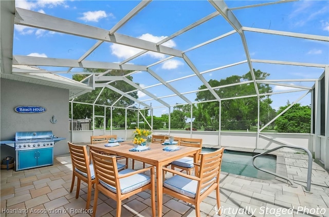 897 Entrance Rd, Avon Park, FL 33825 - view of patio featuring outdoor dining space, grilling area, and a lanai