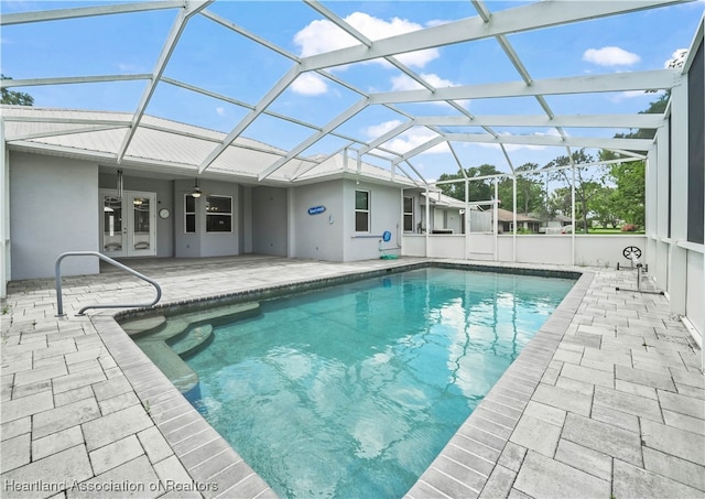 897 Entrance Rd, Avon Park, FL 33825 - outdoor pool with a lanai, french doors, and a patio area